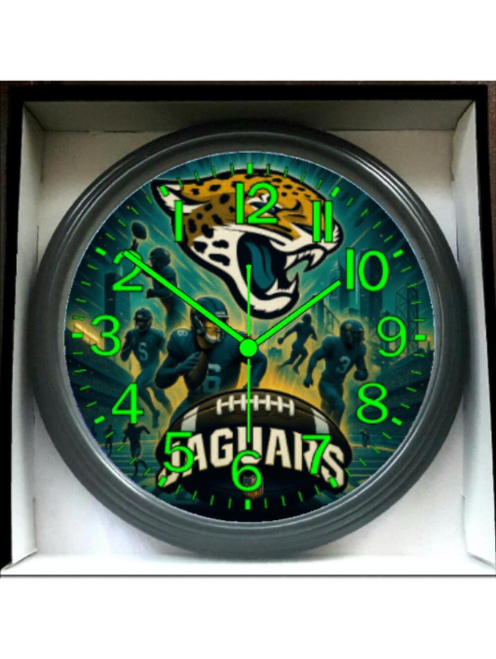 REVERSE TICKING CLOCK Jacksonville Jaguars NFL Glow In The Dark Wall Clock New!